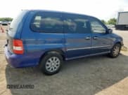 ✅ 2004 Kia Sedona LX • VIN: KNDUP131346493862 • Lot: 57237605. Listed on Copart with 230,104 mi. Free auction sales archive from the USA and detailed vehicle history report at DreamBid. Image 3.