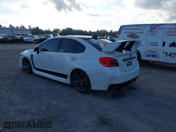 ✅ 2016 Subaru WRX • VIN: JF1VA1B64G9816327 • Lot: 43655907. Listed on IAAI with 100,580 mi. Free auction sales archive from the USA and detailed vehicle history report at DreamBid. Image 3.