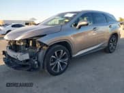 ✅ 2018 Lexus RX 350L Premium • VIN: JTJGZKCA6J2007493 • Лот: 43615191. Опубликован ранее на IAAI с пробегом 143 112 миль. Бесплатный доступ к архиву аукционных продаж из США и подробный отчёт об истории автомобиля на DreamBid. Изображение 19.