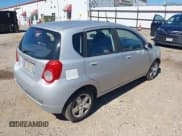 ✅ 2009 Chevrolet Aveo 1LT • VIN: KL1TD66E19B651119 • Lot: 41648261. Wystawiony na IAAI z przebiegiem 132 456 mil. Bezpłatny archiwum sprzedaży aukcyjnych z USA i szczegółowy raport historii pojazdu na DreamBid. Zdjęcie 4.