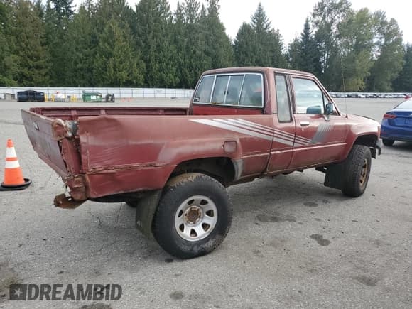 ✅ 1987 Toyota Pickup • VIN: JT4RN67DXH5058149 • Lot: 71949775. Listed on Copart with 202,880 mi. Free auction sales archive from the USA and detailed vehicle history report at DreamBid. Image 3.