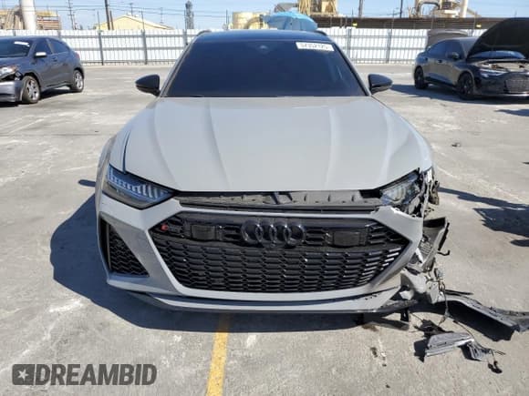 ✅ 2021 Audi RS 6 • VIN: WUA1CBF21MN908467 • Лот: 57352125. Опубликован ранее на Copart с пробегом 24 727 миль. Бесплатный доступ к архиву аукционных продаж из США и подробный отчёт об истории автомобиля на DreamBid. Изображение 5.