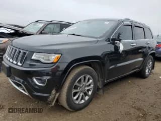 ✅ 2015 Jeep Grand Cherokee Overland • VIN: 1C4RJFCM7FC880093 • Lot: 82241784. Listed on Copart with 158,346 mi. Free auction sales archive from the USA and detailed vehicle history report at DreamBid. Image 1.