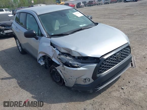 ✅ 2022 Toyota Corolla Cross L • VIN: 7MUAAAAG7NV009940 • Лот: 42117351. Опубликован ранее на IAAI с пробегом 23 290 миль. Бесплатный доступ к архиву аукционных продаж из США и подробный отчёт об истории автомобиля на DreamBid. Изображение 6.