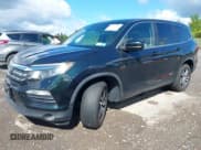 ✅ 2017 Honda Pilot EX-L • VIN: 5FNYF6H59HB091514 • Lot: 43083784. Listed on IAAI with 97,606 mi. Free auction sales archive from the USA and detailed vehicle history report at DreamBid. Image 18.