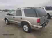1999 Chevrolet Blazer LS z VIN 1GNDT13W7X2210017, wystawiony jako Copart lot #80454764 z przebiegiem 120 465 mil mil oraz Szkoda całkowita • Salvage title. Historia ofert i sprzedaży dostępna na DreamBid. Obrazek 2.