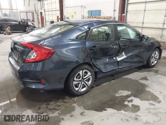 ✅ 2017 Honda Civic LX • VIN: 19XFC2F56HE221119 • Lot: 43572775. Listed on IAAI with 97,666 mi. Free auction sales archive from the USA and detailed vehicle history report at DreamBid. Image 4.