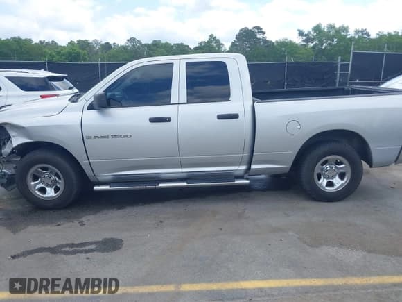 ✅ 2011 Ram 1500 SLT • VIN: 1D7RB1GP2BS500684 • Lot: 42133329. Listed on IAAI with 124,095 mi. Free auction sales archive from the USA and detailed vehicle history report at DreamBid. Image 15.