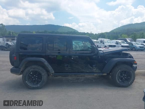 ✅ 2021 Jeep Wrangler Unlimited Willys • VIN: 1C4HJXDN7MW504854 • Lot: 42605357. Wystawiony na IAAI z przebiegiem 74 092 mil. Bezpłatny archiwum sprzedaży aukcyjnych z USA i szczegółowy raport historii pojazdu na DreamBid. Zdjęcie 13.