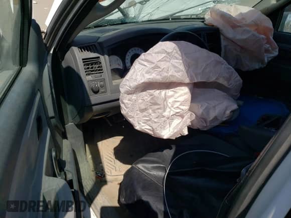 2007 Dodge Dakota ST z VIN 1D7HE28K37S227337, wystawiony jako Copart lot #68823855 z przebiegiem Nie podano mil oraz Szkoda całkowita • Salvage title. Historia ofert i sprzedaży dostępna na DreamBid. Obrazek 8.