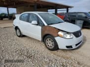 ✅ 2012 Suzuki SX4 LE • VIN: JS2YC5A34C6305539 • Lot: 68473245. Listed on Copart with 175,567 mi. Free auction sales archive from the USA and detailed vehicle history report at DreamBid. Image 4.