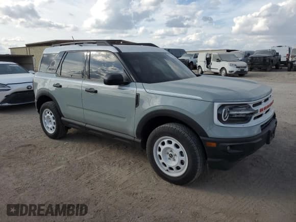 ✅ 2024 Ford Bronco Sport Heritage • VIN: 3FMCR9G69RRE50658 • Lot: 89914685. Listed on Copart with 42,398 mi. Free auction sales archive from the USA and detailed vehicle history report at DreamBid. Image 4.