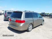 ✅ 2010 Honda Odyssey Touring • VIN: 5FNRL3H93AB069531 • Lot: 42462835. Listed on IAAI with 241,297 mi. Free auction sales archive from the USA and detailed vehicle history report at DreamBid. Image 4.