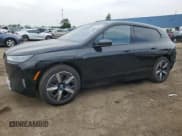 ✅ 2024 BMW iX xDrive50 • VIN: WB523CF01RCN55992 • Лот: 59352604. Опубликован ранее на Copart с пробегом 8 415 миль. Бесплатный доступ к архиву аукционных продаж из США и подробный отчёт об истории автомобиля на DreamBid. Изображение 1.