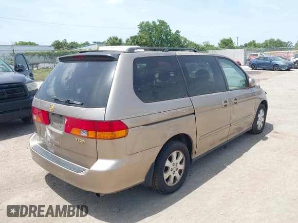 ✅ 2003 Honda Odyssey EX-L • VIN: 5FNRL18733B002370 • Лот: 42080346. Опубликован ранее на IAAI с пробегом 199 289 миль. Бесплатный доступ к архиву аукционных продаж из США и подробный отчёт об истории автомобиля на DreamBid. Изображение 4.