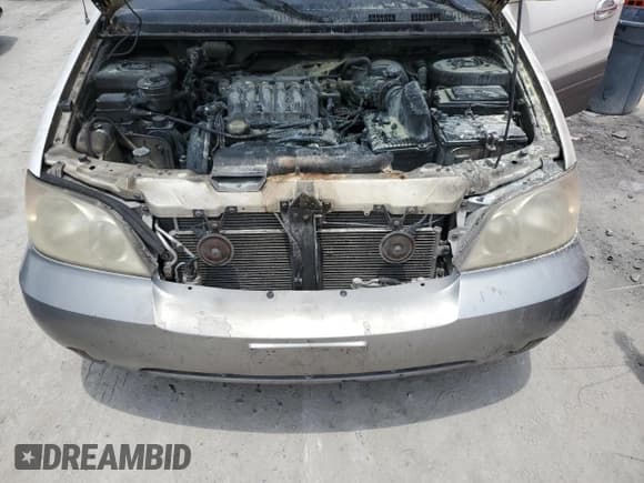 ✅ 2002 Kia Sedona LX • VIN: KNDUP131826116599 • Lot: 55833865. Listed on Copart with 156,961 mi. Free auction sales archive from the USA and detailed vehicle history report at DreamBid. Image 12.