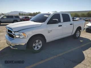 2022 Ram 1500 Tradesman with VIN 3C6RR6KG4NG218138, listed as a Copart auction lot 82134105 with 33,991 mi miles and Salvage title. Bid and sale history available at DreamBid. Image 1.