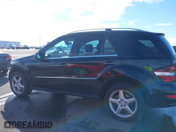 ✅ 2009 Mercedes-Benz M 550 • VIN: 4JGBB72E29A519199 • Lot: 41716072. Listed on IAAI with 192,452 mi. Free auction sales archive from the USA and detailed vehicle history report at DreamBid. Image 14.