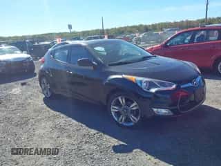 2017 Hyundai Veloster z VIN KMHTC6AD9HU324489, wystawiony jako IAAI lot #43441158 z przebiegiem 103 056 mil mil oraz . Historia ofert i sprzedaży dostępna na DreamBid. Obrazek 1.