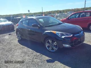 ✅ 2017 Hyundai Veloster • VIN: KMHTC6AD9HU324489 • Lot: 43441158. Wystawiony na IAAI z przebiegiem 103 056 mil. Bezpłatny archiwum sprzedaży aukcyjnych z USA i szczegółowy raport historii pojazdu na DreamBid. Zdjęcie 1.
