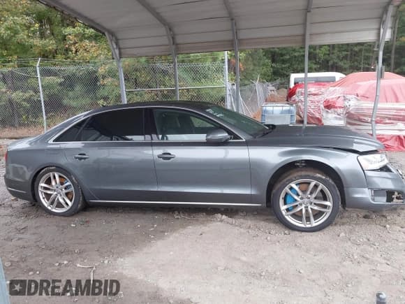 ✅ 2015 Audi A8 4.0T • VIN: WAU32AFD7FN019029 • Lot: 43455517. Wystawiony na IAAI z przebiegiem 91 576 mil. Bezpłatny archiwum sprzedaży aukcyjnych z USA i szczegółowy raport historii pojazdu na DreamBid. Zdjęcie 13.