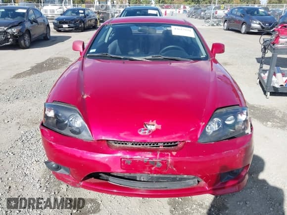 ✅ 2005 Hyundai Tiburon GS • VIN: KMHHM65D45U183100 • Лот: 43627934. Опубликован ранее на IAAI с пробегом 130 401 миль. Бесплатный доступ к архиву аукционных продаж из США и подробный отчёт об истории автомобиля на DreamBid. Изображение 6.