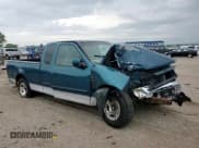 ✅ 2000 Ford F-150 XL • VIN: 1FTRX17W5YKA51593 • Lot: 66225685. Wystawiony na Copart z przebiegiem Nie podano. Bezpłatny archiwum sprzedaży aukcyjnych z USA i szczegółowy raport historii pojazdu na DreamBid. Zdjęcie 13.