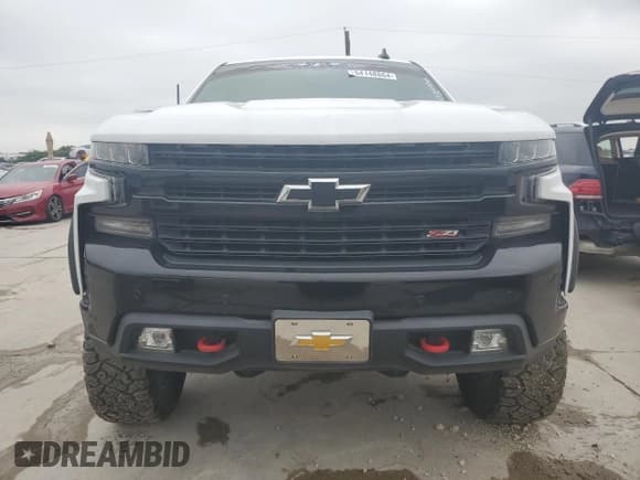✅ 2021 Chevrolet Silverado 1500 LT Trail Boss • VIN: 1GCPYFED4MZ171275 • Lot: 54148864. Wystawiony na Copart z przebiegiem 57 983 mil. Bezpłatny archiwum sprzedaży aukcyjnych z USA i szczegółowy raport historii pojazdu na DreamBid. Zdjęcie 5.