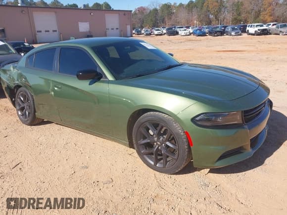 ✅ 2023 Dodge Charger SXT • VIN: 2C3CDXBG1PH592331 • Lot: 43713215. Listed on IAAI with 37,011 mi. Free auction sales archive from the USA and detailed vehicle history report at DreamBid. Image 1.