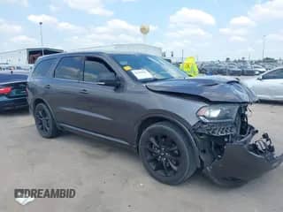2018 Dodge Durango R/T with VIN 1C4SDHCT5JC370071, listed as a IAAI auction lot 43159489 with 112,215 mi miles and . Bid and sale history available at DreamBid. Image 1.