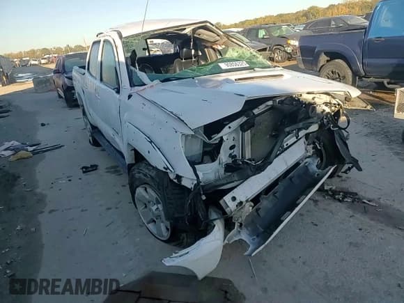 ✅ 2015 Toyota Tacoma • VIN: 3TMLU4EN7FM169001 • Lot: 90856325. Wystawiony na Copart z przebiegiem Nie podano. Bezpłatny archiwum sprzedaży aukcyjnych z USA i szczegółowy raport historii pojazdu na DreamBid. Zdjęcie 13.