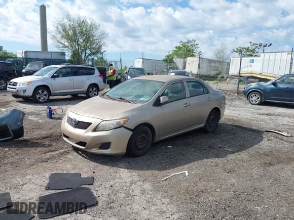 ✅ 2009 Toyota Corolla • VIN: 2T1BU40EX9C022039 • Lot: 42230127. Listed on IAAI with 131,506 mi. Free auction sales archive from the USA and detailed vehicle history report at DreamBid. Image 2.