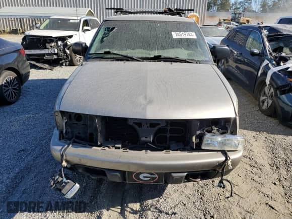 2004 Chevrolet Blazer LS z VIN 1GNDT13X04K168259, wystawiony jako Copart lot #74519744 z przebiegiem 126 248 mil mil oraz Szkoda całkowita • Salvage title. Historia ofert i sprzedaży dostępna na DreamBid. Obrazek 5.