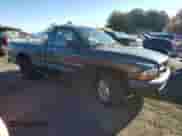 2000 Dodge Dakota with VIN 1B7FL26P0YS764903, listed as a Copart auction lot 76695194 with 166,471 mi miles and Salvage title. Bid and sale history available at DreamBid. Image 4.