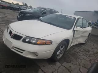 ✅ 2002 Pontiac Bonneville SE • VIN: 1G2HX54K224203950 • Lot: 66404234. Wystawiony na Copart z przebiegiem 118 617 mil. Bezpłatny archiwum sprzedaży aukcyjnych z USA i szczegółowy raport historii pojazdu na DreamBid. Zdjęcie 1.