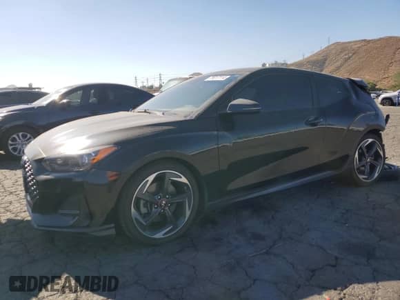 2019 Hyundai Veloster Turbo R-Spec z VIN KMHTH6AB8KU006287, wystawiony jako Copart lot #79017114 z przebiegiem 71 751 mil mil oraz Szkoda całkowita • Salvage title. Historia ofert i sprzedaży dostępna na DreamBid. Obrazek 1.