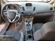 ✅ 2016 Ford Fiesta SE • VIN: 3FADP4BJ4GM205537 • Lot: 87049875. Wystawiony na Copart z przebiegiem 170 378 mil. Bezpłatny archiwum sprzedaży aukcyjnych z USA i szczegółowy raport historii pojazdu na DreamBid. Zdjęcie 8.