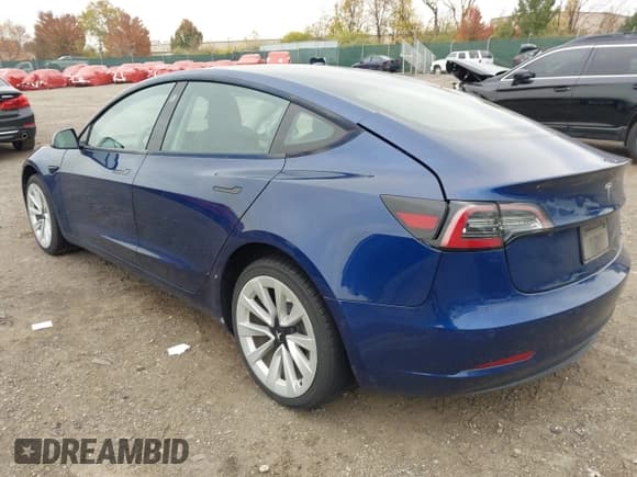 ✅ 2022 Tesla Model 3 • VIN: 5YJ3E1EA6NF189610 • Lot: 43601703. Listed on IAAI with 81,045 mi. Free auction sales archive from the USA and detailed vehicle history report at DreamBid. Image 3.