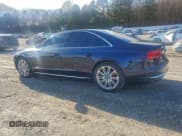 ✅ 2014 Audi A8 4.0T • VIN: WAUA2AFD4EN005739 • Lot: 96143175. Listed on Copart with 120,860 mi. Free auction sales archive from the USA and detailed vehicle history report at DreamBid. Image 2.