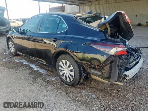 2021 Toyota Camry Hybrid LE с VIN 4T1C31AK1MU022481, выставлен на аукционе Copart как лот 80663205 с пробегом 98 591 миль миль и Чистый • Clean title. История ставок и продаж доступна на DreamBid. Изображение 2.