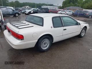 ✅ 1995 Mercury Cougar XR7 • VIN: 1MELM62W1SH643756 • Лот: 42406525. Опубликован ранее на IAAI с пробегом 78 015 миль. Бесплатный доступ к архиву аукционных продаж из США и подробный отчёт об истории автомобиля на DreamBid. Изображение 4.