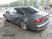 ✅ 2015 Audi A8 4.0T • VIN: WAU32AFD7FN019029 • Lot: 43455517. Wystawiony na IAAI z przebiegiem 91 576 mil. Bezpłatny archiwum sprzedaży aukcyjnych z USA i szczegółowy raport historii pojazdu na DreamBid. Zdjęcie 3.