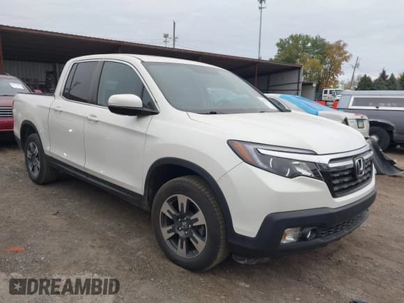 ✅ 2019 Honda Ridgeline RTL • VIN: 5FPYK2F5XKB004418 • Лот: 43572773. Опубликован ранее на IAAI с пробегом 70 040 миль. Бесплатный доступ к архиву аукционных продаж из США и подробный отчёт об истории автомобиля на DreamBid. Изображение 1.