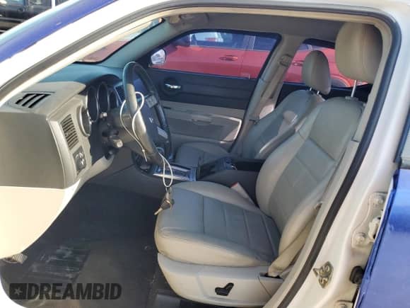 2006 Dodge Charger R/T with VIN 2B3KA53H76H521937, listed as a Copart auction lot 77455534 with 103,060 mi miles and Salvage title. Bid and sale history available at DreamBid. Image 7.