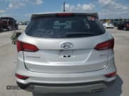 ✅ 2018 Hyundai Santa Fe 2.4L • VIN: 5XYZT3LB9JG545770 • Лот: 57638114. Опубликован ранее на Copart с пробегом Не указан. Бесплатный доступ к архиву аукционных продаж из США и подробный отчёт об истории автомобиля на DreamBid. Изображение 6.