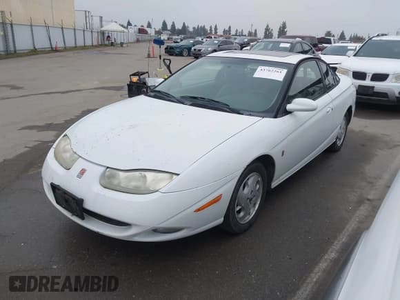 ✅ 2002 Saturn SC • VIN: 1G8ZY12732Z161127 • Лот: 43762261. Опубликован ранее на IAAI с пробегом 182 657 миль. Бесплатный доступ к архиву аукционных продаж из США и подробный отчёт об истории автомобиля на DreamBid. Изображение 2.