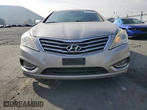 2013 Hyundai Azera с VIN KMHFG4JG7DA230882, выставлен на аукционе Copart как лот 43561825 с пробегом 177 154 миль миль и Списание • Salvage title. История ставок и продаж доступна на DreamBid. Изображение 5.