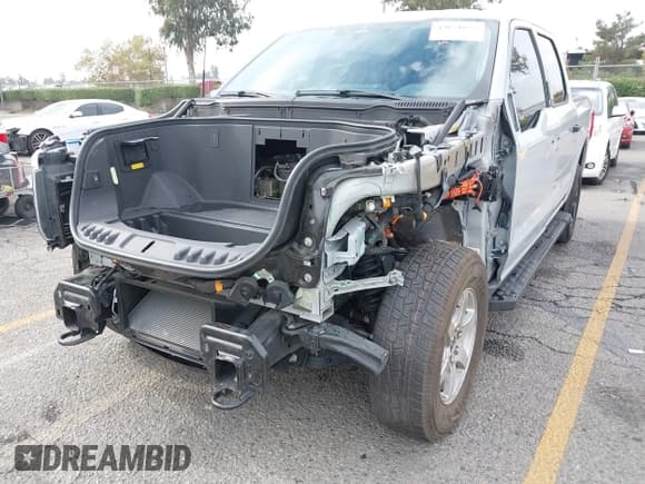 ✅ 2023 Ford F-150 Lightning Pro • VIN: 1FTVW1EL6PWG60371 • Лот: 43651652. Опубликован ранее на IAAI с пробегом 27 284 миль. Бесплатный доступ к архиву аукционных продаж из США и подробный отчёт об истории автомобиля на DreamBid. Изображение 6.