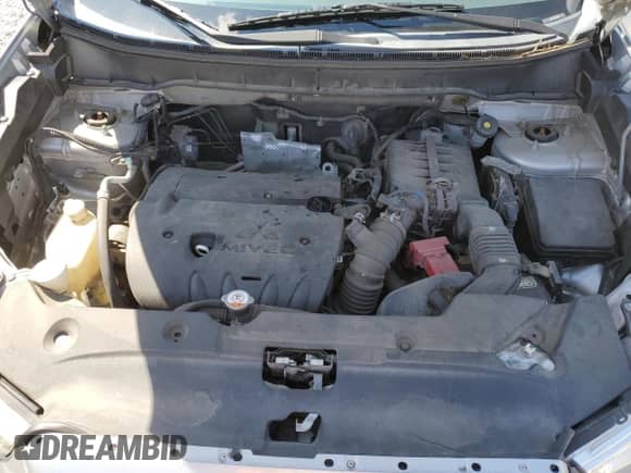 2014 Mitsubishi Outlander ES z VIN 4A4AR3AUXEE029036, wystawiony jako Copart lot #71371585 z przebiegiem 128 790 mil mil oraz Czysty tytuł • Clean title. Historia ofert i sprzedaży dostępna na DreamBid. Obrazek 11.