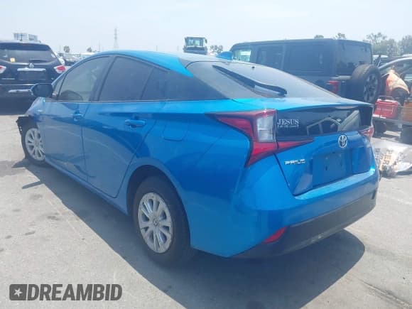 ✅ 2021 Toyota Prius L Eco • VIN: JTDKAMFUXM3134462 • Lot: 42450931. Listed on IAAI with 89,239 mi. Free auction sales archive from the USA and detailed vehicle history report at DreamBid. Image 3.